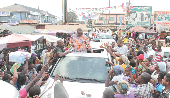 Dr Hassan Ayariga mobbed by traders during his visit to the Madina market. Picture: MAXWELL OCLOO Dr Hassan Ayariga mobbed by traders during his visit to the Madina market. Picture: MAXWELL OCLOO